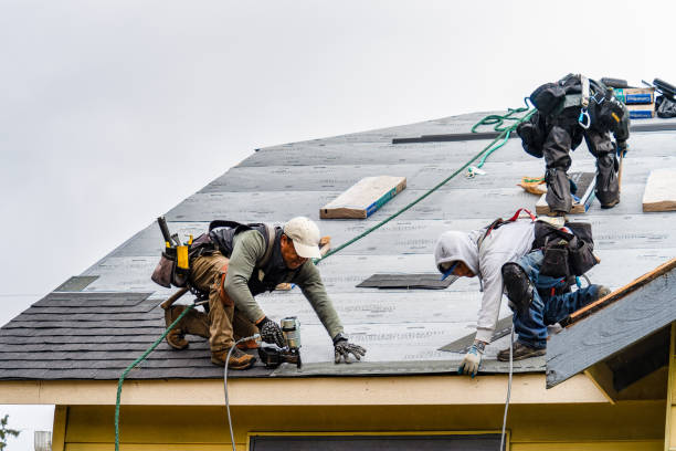 Professional Gutter Installation technician working in Greentown, IN